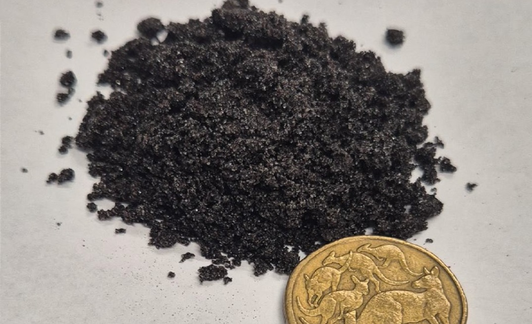 Cassiterite grains grading 7.99% tin