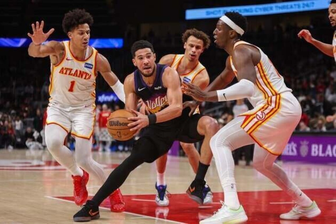 Hawks down Suns after Devin Booker exits with ankle injury