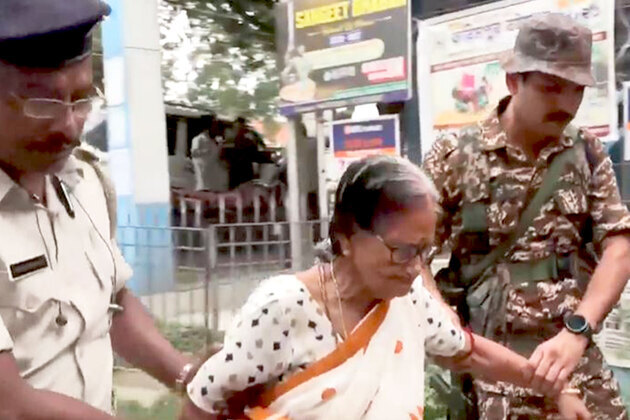 WB polls: Security forces officials assist elderly voters to cast their votes