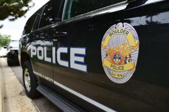 Woman arrested for threatening for Boulder school group