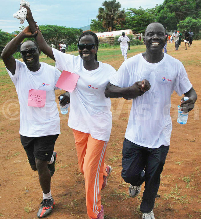  articipants celebrate after completing the race 