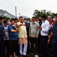 Uttarakhand CM Dhami meets disaster-affected residents of Majhara village in Sahastradhara