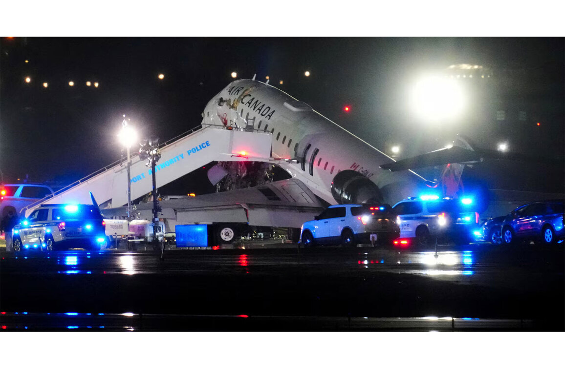 Two pilots killed, 41 injured as Air Canada flight hits fire rescue vehicle at LaGuardia Airport