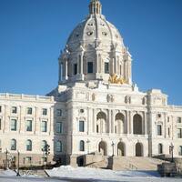 At whose expense will Minnesota balance its budget&quest;