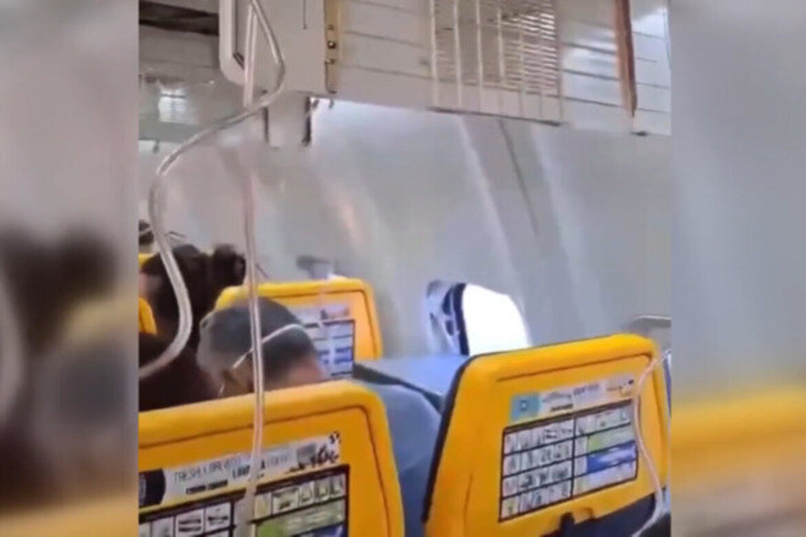 Boeing passenger partially sucked out of dislodged window mid-flight 