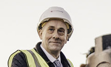 Lord Callanan, parliamentary undersecretary of state at the Department for Business, Energy and Industrial Strategy, at the site of the borehole drilling for the ground source heating project at Chadwell St Mary. Credit: Kensa