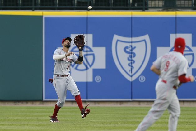 Romine carries Tigers to victory over Reds