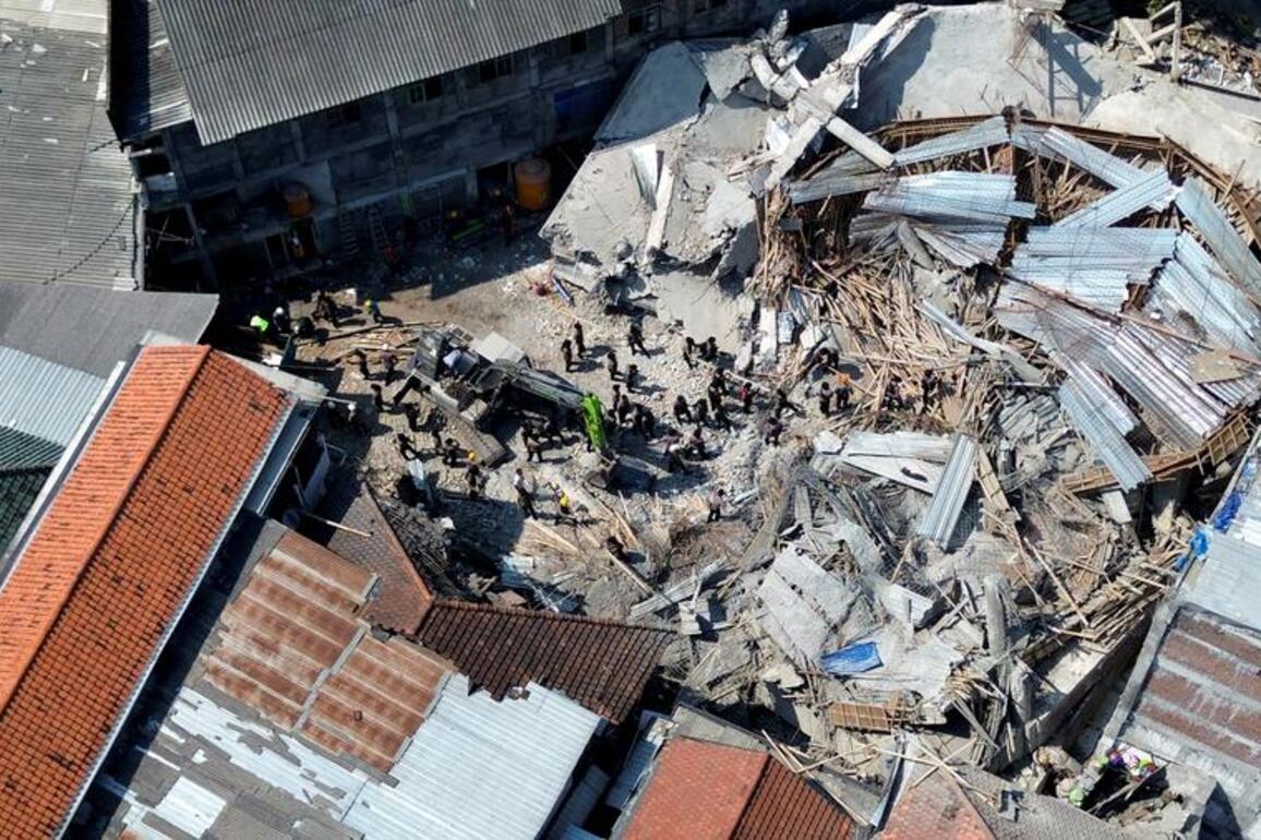 Death toll from Indonesia school building collapse rises to 20