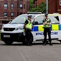 Pensioner rushed to hospital after 'shooting' on Glasgow street as area taped off