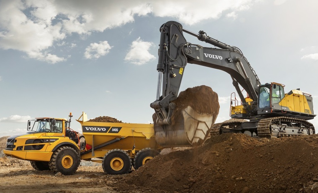 Construction scene Caterpillar excavator digs with force against blue sky,  near concrete pipe. Vertical Mobile Wallpaper AI Generated 30465773 Stock  Photo at Vecteezy