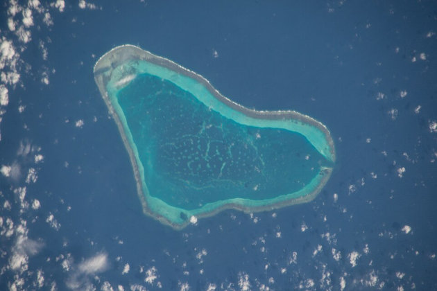 Chinese military raises temperatures in disputed South China Sea shoal