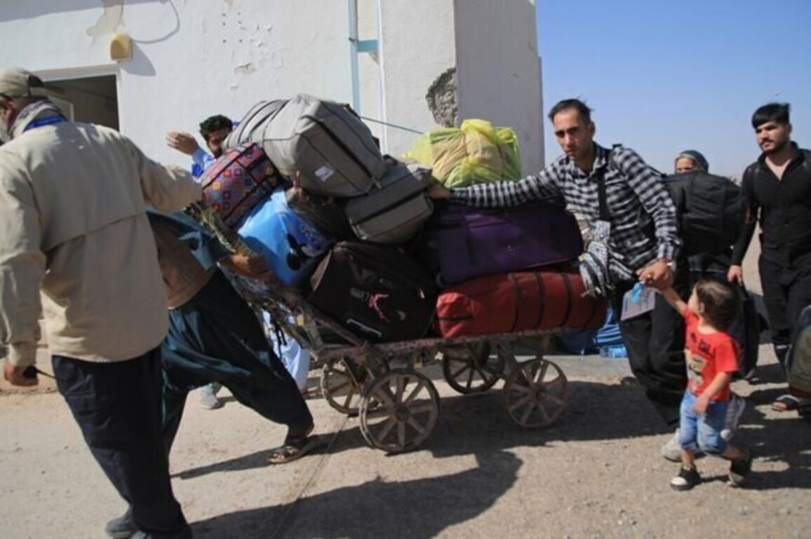 Afghan Migrants In Iran Face Growing Hardship Amid War Fallout