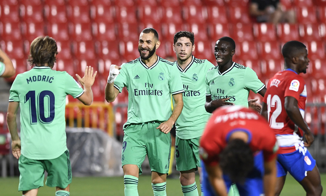 Real Madrid one win away from title after beating Granada Real Madrid one win away from title after beating Granada