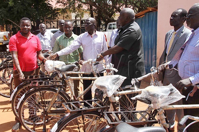  ira branch manager ycle onnect nthony gali hands over 50 bicycles to  ilton dongo
