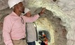 Prospect staff examining mineralised lithium pegmatite within the Karlsbrunn adit