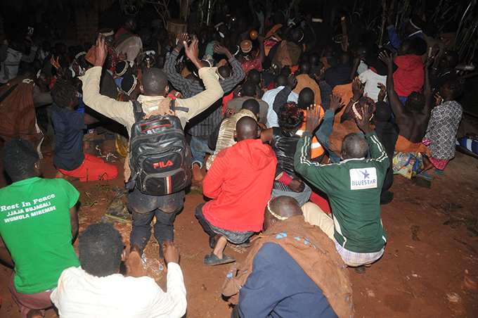 ome of the aswezi community members kneeling down in respect at 236am after udhagali was laid to rest hoto by onald iirya