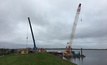  A Giken F201 silent piling press is being used by Sheet Piling (UK) Ltd to install sheet piles through the existing core of the embankment at Staines Reservoir