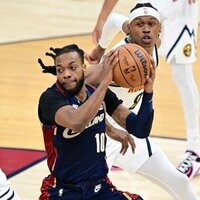 Cavaliers use late run to beat banged-up Nuggets