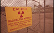 Sign at shuttered uranium mill in Rifle warns onlookers (Bill Gillette, U.S. National Archives and Records Admin.)