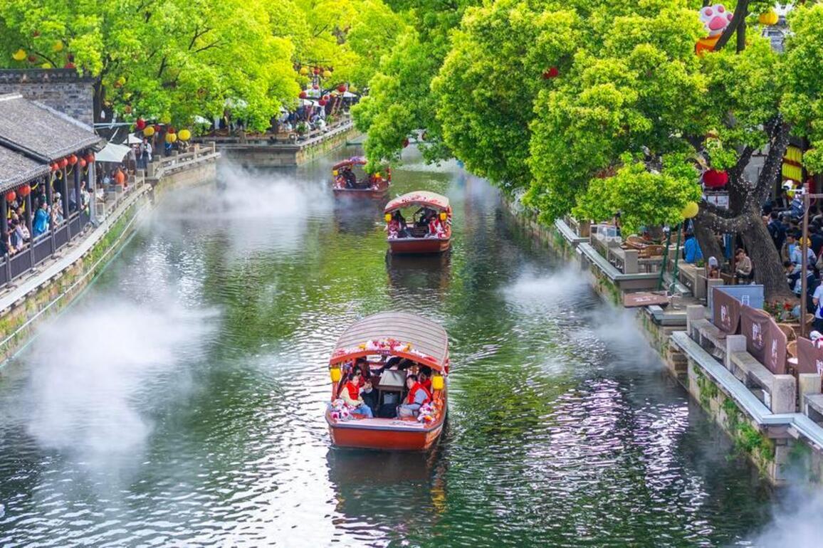 May Day holiday in China's old town brimming with culture, learning, and economic buzz