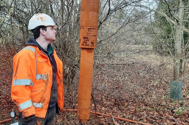 Iron deposits fouling the pump and riser main severely restricted water flow, compromising pump performance