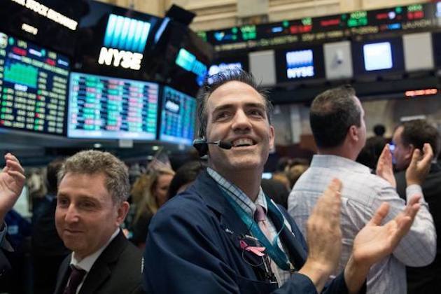 Wall Street closes higher Wednesday, Dow Jones gains 294 points
