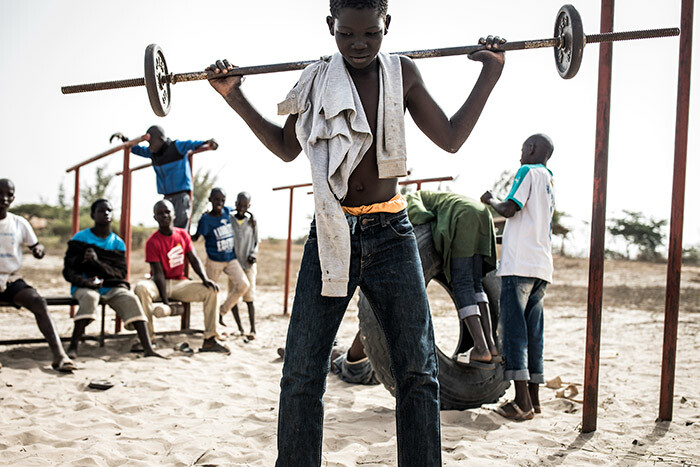 oung street children also referred to as alibe play with weights in a quarantined area at a refuge for newly arrived street children outside akar on pril 10 2020 hotos by    