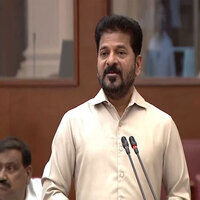 Telangana CM Revanth Reddy hands over Rs 1 crore insurance cheques to deceased Singareni workers' families