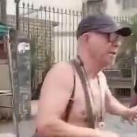 Gory moment man pushes his 100-year-old mother's corpse in wheelchair down the street