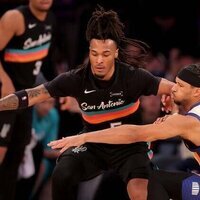 Knicks excel, snap Spurs' 11-game winning streak