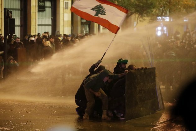New Government in Crisis-Hit Lebanon, But Protests Continue