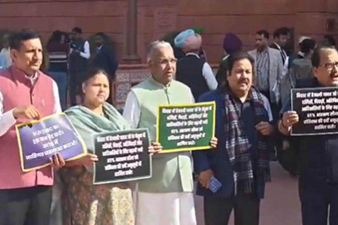 RJD MPs protest outside Parliament, demand resignation of PM Modi, Nitish Kumar