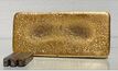  Gold doré bar 517 from the final gold pour of the September 2023 quarter at the Okvau gold mine