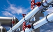 Pipes for gas supply on concrete supports. Credit: Shutterstock/FOTOGRIN