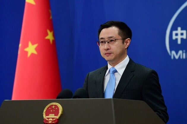 China blames "unwarranted" US interrogation for scholar's death; demands "responsible explanation" from Washington