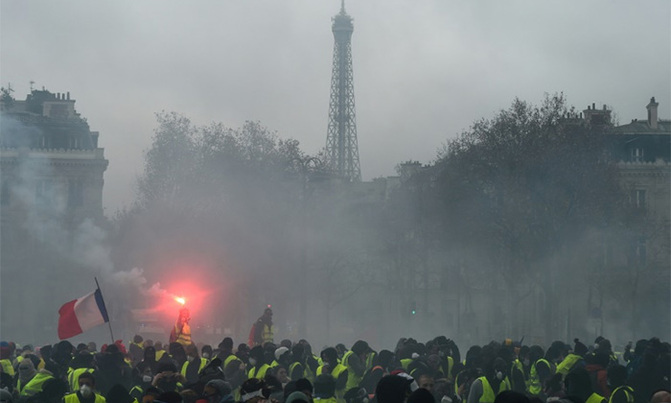 France halts fuel tax hikes in bid to calm fiery protests France halts fuel tax hikes in bid to calm fiery protests