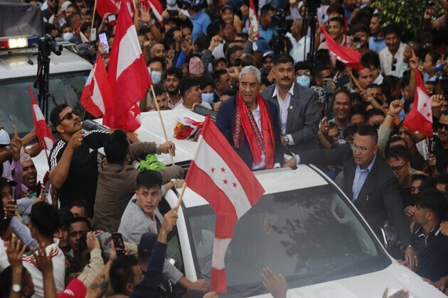 Nepal's ex-PM Deuba, beaten in Gen-Z protest, returns after months abroad for treatment, receives grand welcome