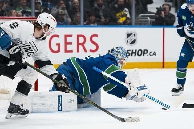 Jake DeBrusk's second goal of game lifts Canucks past Kings in OT