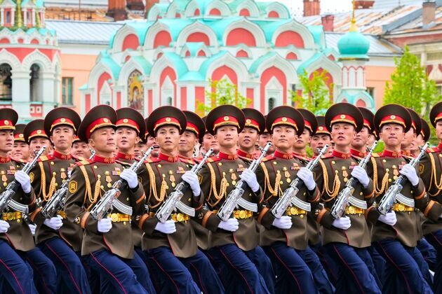 North Korean soldiers parade in Moscow for first time as Kim Jong Un skips event