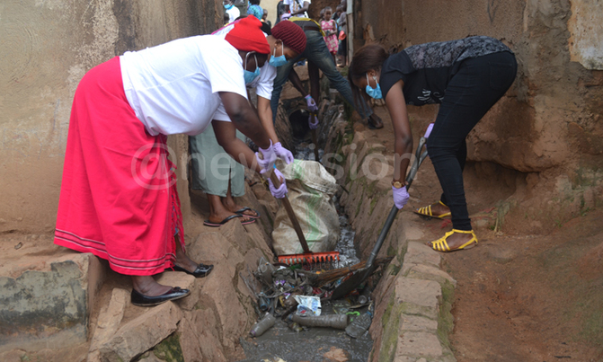 CSOs, residents clean up stinking trenches in Kampala CSOs, residents clean up stinking trenches in Kampala