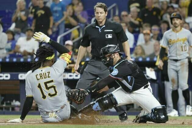 Marlins keep coming back, edge Pirates in 12 innings