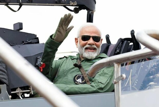 Modi flies India-made combat aircraft