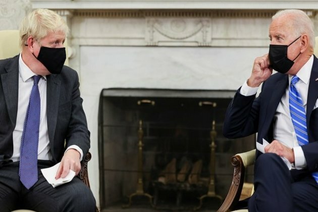 Biden-Johnson stress action on climate change
