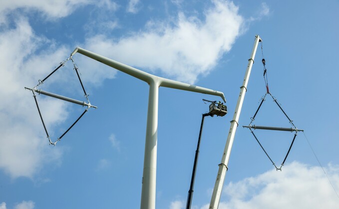 T-pylon diamond insulators being installed on Hinkley Connection Project Credit: National Grid