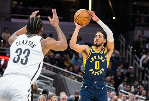 Pacers breeze by fading Nets