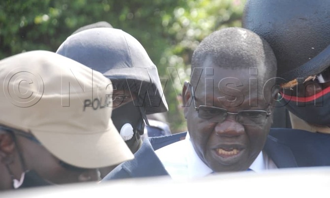 Police dump barefooted Amuriat at Kyambogo Police dump barefooted Amuriat at Kyambogo