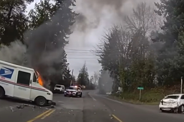 Bodycam shows Pierce County deputy rescues driver from burning mail truck after crash