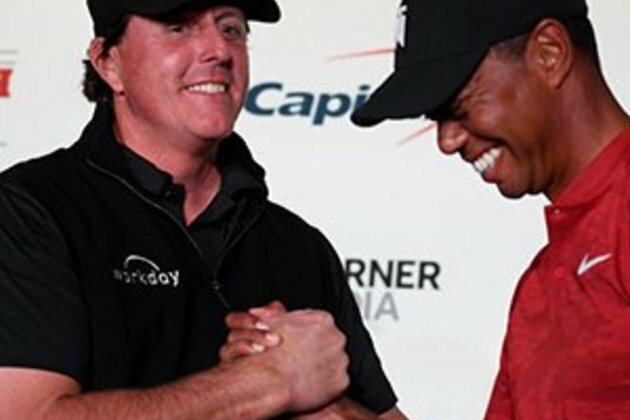 Rival Mickelson gracious with praise for Woods