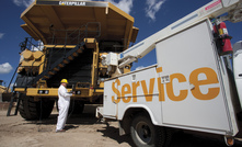 Cat mining truck being serviced in the field