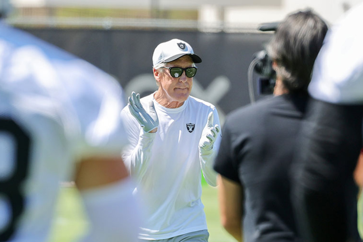 Pete Carroll exhibiting youthful enthusiasm with Raiders